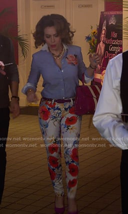 Coralee's striped shirt and white floral pants on Insatiable