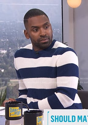 Justin's blue and white striped sweater on E! News Daily Pop