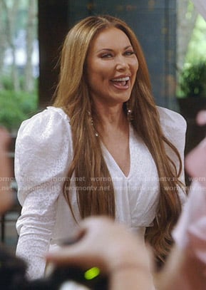LeeAnne's white leopard plunge neck dress on The Real Housewives of Dallas