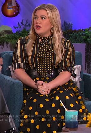 Kelly's black and yellow star print blouse and skirt on The Kelly Clarkson Show