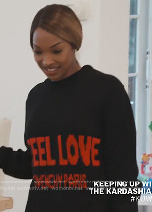 Malika's black I Feel Live Sweater on Keeping Up with the Kardashians
