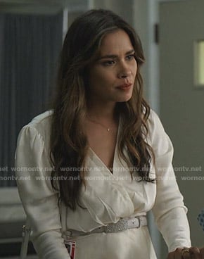 Cristal's white polka dot wrap top on Dynasty