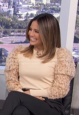 Erin's beige tulle sleeve sweater on E! News