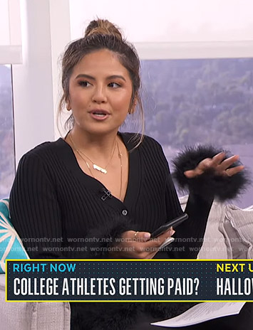 Erin's black ribbed feather trimmed cardigan on Live from E!