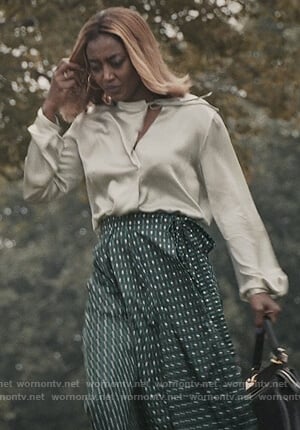 Daisy's tie neck blouse and green print midi skirt on Madam Secretary