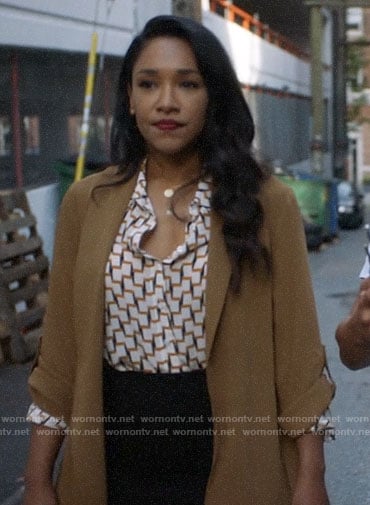Iris's camel jacket on The Flash