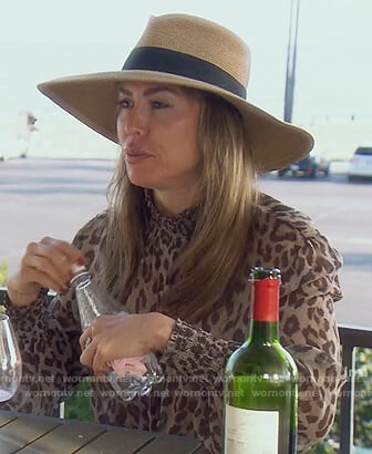 Kelly's leopard tie neck blouse on The Real Housewives of Orange County