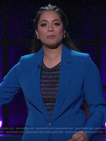 Lilly Singh's blue suit and metallic striped top on A Little Late with Lilly Singh