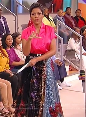 Tamron's pink satin top and metallic skirt on Tamron Hall Show