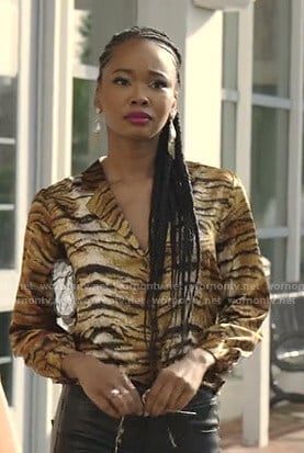 Monica's yellow tiger print shirt on Dynasty