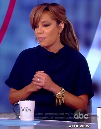 Sunny's navy short sleeve jumpsuit on The View