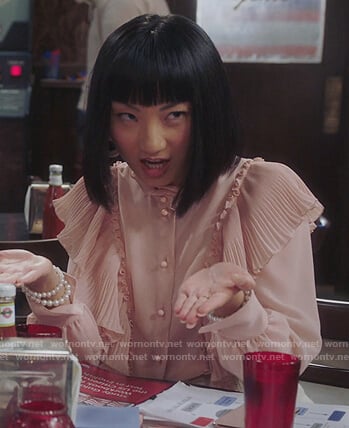 Mei's pink ruffled blouse on Sunnyside