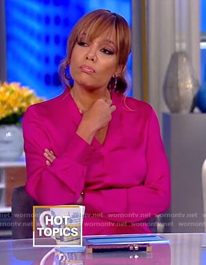 Sunny's pink asymmetric satin dress on The View