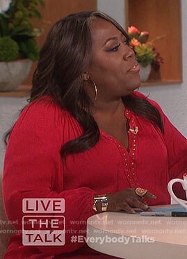 Sheryl's red studded top on The Talk