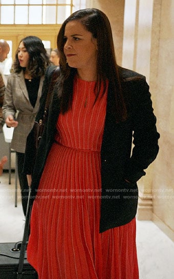 Sara's coral pleated dress on All Rise