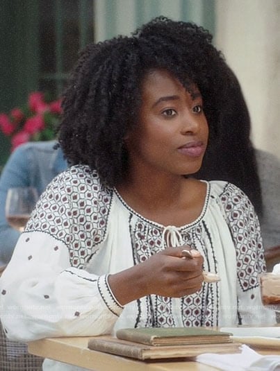 Simone's white peasant top on The Good Place