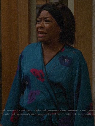 Tina's blue floral robe on The Neighborhood