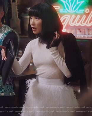 Mei's lace trim sweater and feather skirt on Sunnyside