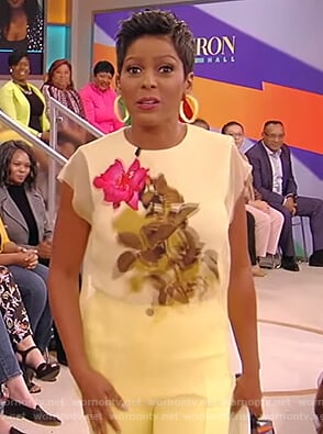Tamron's yellow floral mesh top on the Tamron Hall Show