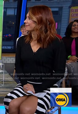 Ginger's black ribbed v-neck sweater and striped skirt on Good Morning America