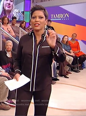 Tamron's black contrast trim blouse and pants on Tamron Hall Show