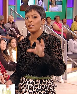Tamron's black sheer leopard blouse and pants on Tamron Hall Show