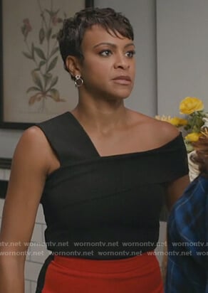 Angela's black one shoulder top on American Housewife