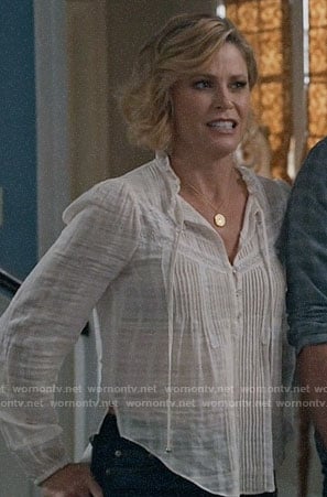 Claire's white pintuck top on Modern Family