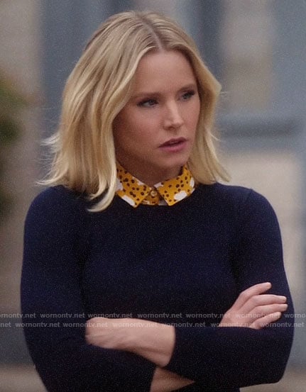 Eleanor's navy sweater and yellow sheep print shirt on The Good Place