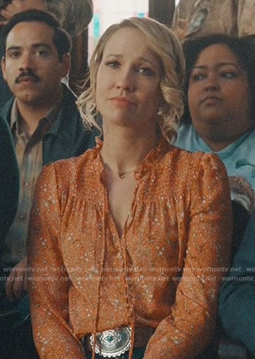 Ginny's orange floral blouse on Perfect Harmony