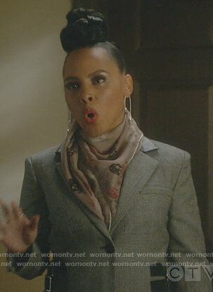 Tegan's gray plaid coat with side straps on How to Get Away with Murder