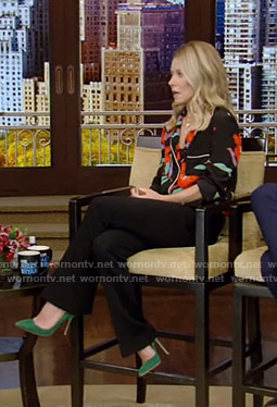 Kelly's black floral shirt and flare pants on Live with Kelly and Ryan