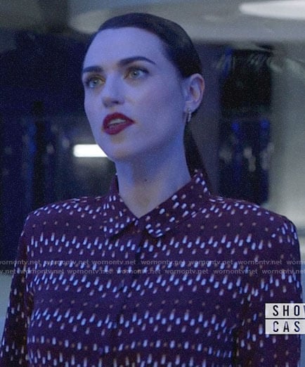 Lena's burgundy printed button down blouse on Supergirl