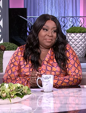 Loni's orange snake print wrap dress on The Real