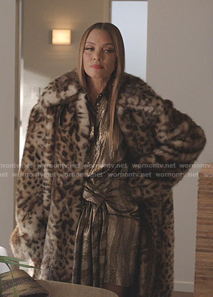 Dominique's striped dress and leopard print coat on Dynasty