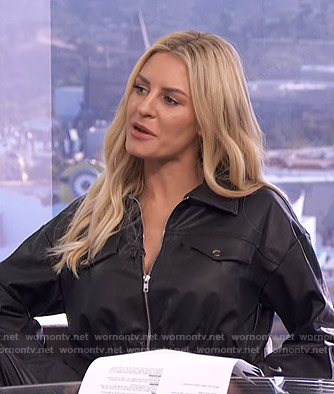 Morgan's black zip front jumpsuit on E! News Daily Pop