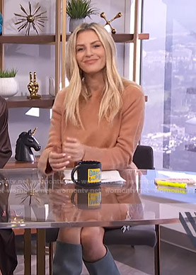 Morgan's orange sweater and knee high boots on E! News Daily Pop
