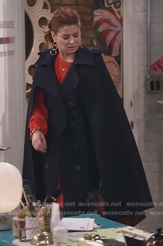 Grace's navy double breasted cape coat on Will and Grace