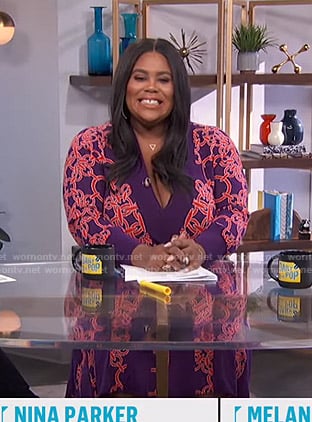 Nina's purple chain print sweater and skirt on E! News Daily Pop