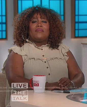 Sheryl's green ruffled top on The Talk