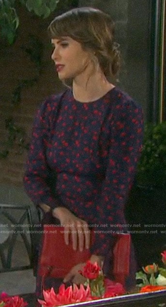 Sarah's navy and red floral dress  at Lani's wedding on Days of our Lives