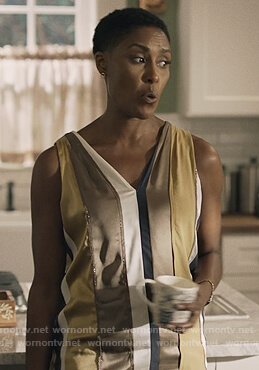 Lynn's striped v-neck top on Black Lightning