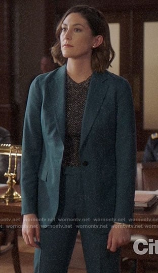 Sydney's teal suit and herringbone top on Bluff City Law