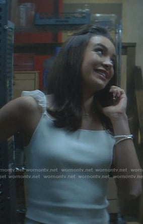 Bess's white ruffle strap top on Nancy Drew