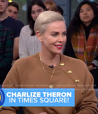 Charlize Theron's camel button detail sweater on Good Morning America