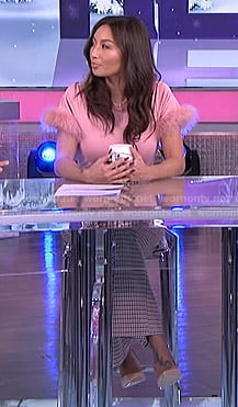 Jeannie's pink feather-trim tee and check pants on The Real