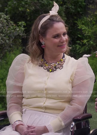 Kimmy's yellow puff sleeve cardigan on Fuller House