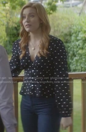 Nancy's black polka dot v-neck blouse on Nancy Drew