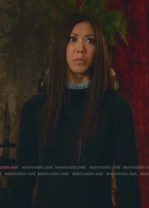 Tina's navy frilled neck sweater on Marvels Runaways