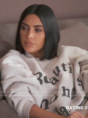 Kim's white Beautiful Mothers Day sweater on Keeping Up with the Kardashians